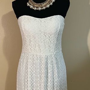 Strapless White Netted Open-Back Dress.